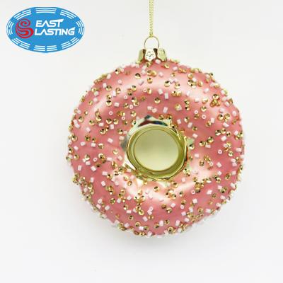 China BSCI Folk Art, Custom Pink Ring Glass Figures Hanging Candy Shaped Christmas Decoration Ornaments Ball for sale