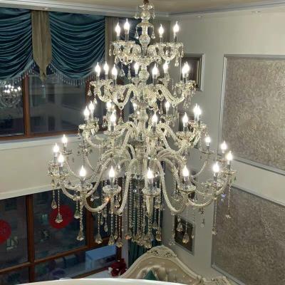 China Modern Luxury large hotel villa living room decoration lighting K9 candle crystal chandelier for high ceilings for sale