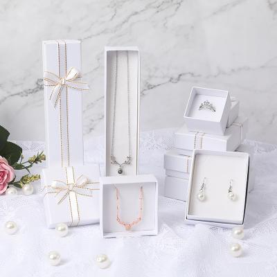 China Multi-size Recyclable Good Quality Black And White Bowknot Earrings Necklace Box Custom Logo Printing White Paper Jewelry Box for sale