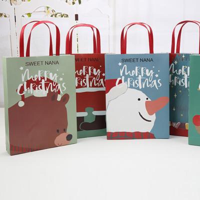 China Cartoon Recyclable Reusable Candy Gift Paper Christmas Shopping Tote Bag for sale