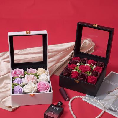 China Creative handmade show valentine's day valentine's day gift packing density black leather clamshell rose box for sale