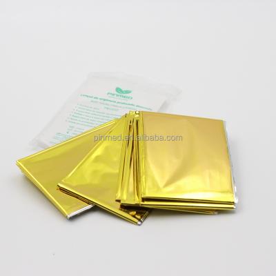 China Gold PET Film PINMED Emergency Mylar Thermal Blankets Outdoor Survival Rescue First Aid Blanket for sale