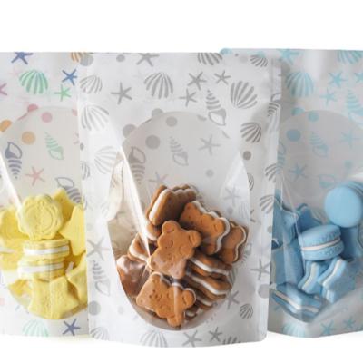 China Moisture-Proof Cute Cartoon Clear Front Window Candy Resealable Snacks Stand Up Pouch Bag for sale