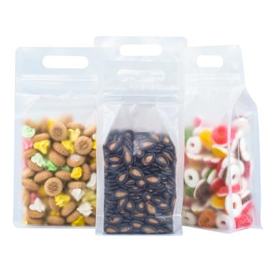 China Moisture Proof PVC Bottom Abrazine Self Supporting Ziplock Packaging Bag With Handles For Dried Fruit Cookies for sale