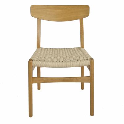 China Modern Nordic Style Rattan Pad Dining Chair With Wooden Frame Legs for sale