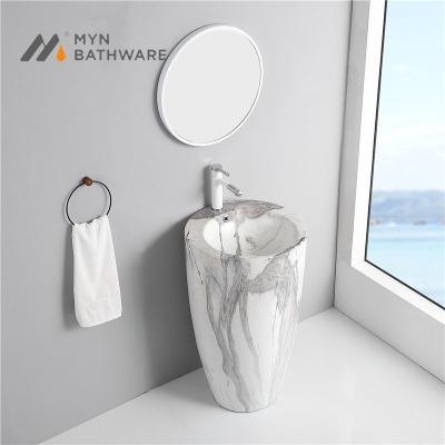 China Wholesale Price Unique Design Nature One Piece Black Stone Back Round Sink Garden Bathroom Marble Wash Basin for sale