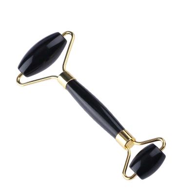 China Face-lift newcomers black obsidian jade roller beauty gem crafts desktop ornaments jade roller massager for sale