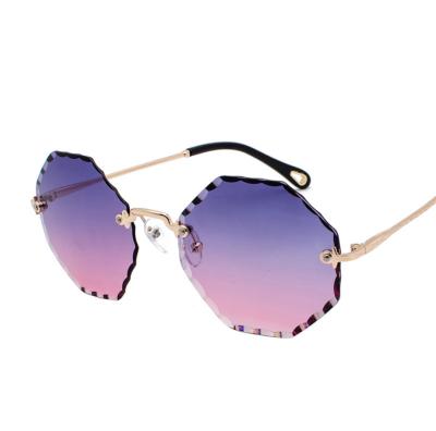 China Fashion Sunglasses 2020 Frameless Retro Fashion Women Wonderful Octagon Sunglasses Cutout Glasses Tinted Lenses 3420 for sale