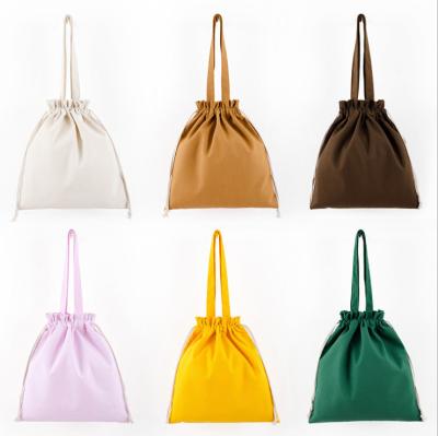 China Various Colors Cotton Drawstring Bag from Drwastring, Simple Cotton Tote Shopping Bag with Cotton Rope for sale