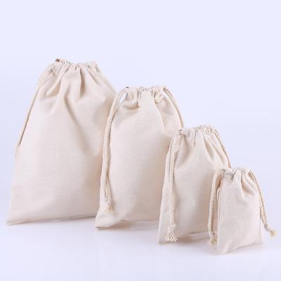 China Custom Eco Friendly Drwastring Mulisn Drawstring Bag Cotton Canvas Gift Package Bag With Cotton Rope for sale