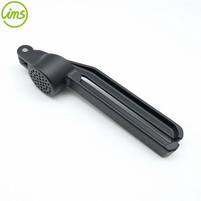 China Stocked kitchen must have the cheapest black garlic press for sale