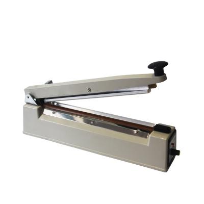 China High Quality Food Sealing Machine Portable Heat Hand Sealer With Side Cutter for sale