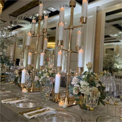 China Wedding Party Wholesale Plating Shiny Gold Metal Candle Holder Centerpieces for sale