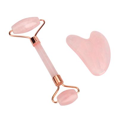 China Handheld pink rose quartz gua sha beauty skin massager jade facial roller face lift best prices for sale