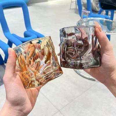 China Home Wholesale Candle Glass Jar Factory Decoration Green Amber Irregular Thick Bottom Unique Colorful Glass Candle Jars for sale