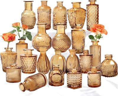 China Art Deco Modern Style Glass Bottle Vases Bulk Mini Flower Vases Decorative Embossed for Home Decor Wedding Centerpiece Stocking for sale