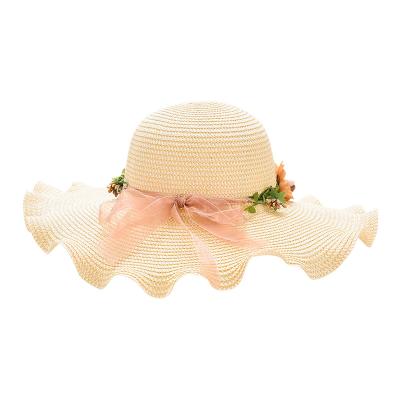 China Striped Women Beach Rolled Brim Handmade Foldable Panama Straw Hat Garland Bowknot Summer Wide Brim Sun Hat Girl Fashion for sale