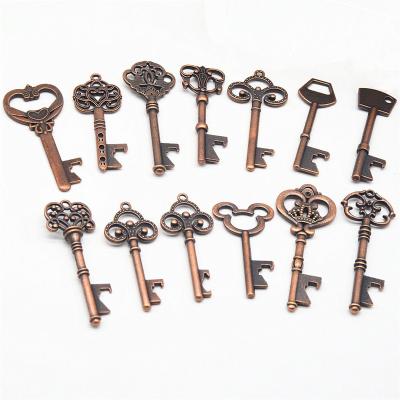 China Viable custom antique key shape beer bottle opener zinc alloy hanging logo water wedding festival gift for sale