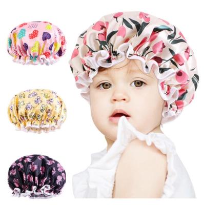 China Sustainable Waterproof Double Layers Bathing Shower Cap Cartoon Printed Shower Caps For Kids Girls for sale