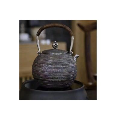 China Handmade Silver Pot Crafts Excellent Sustainable Gifts Exquisitely Carved Spiral Pattern Kettle for sale