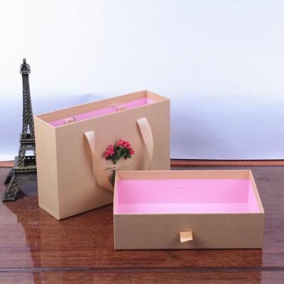 China Readly Recycled Materials For Shipping Portable Flower Drawer Kraft Paper Box Rigid Tape Handle Paper Ribbon Pull-Out Packing Box For Gift for sale