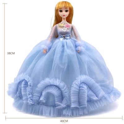 China Battery Operated Toy 30CM Multilayer What Key Pendant Dress Foder Small 3D Doll Fashion Wedding Gift for sale