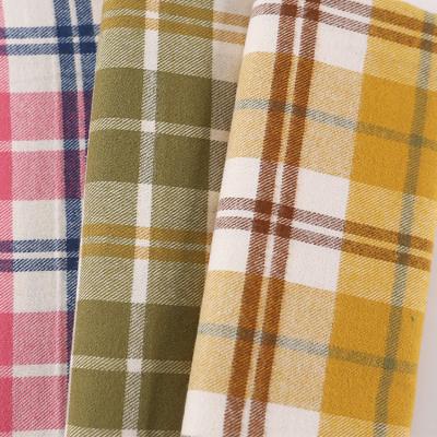 China Viable in stock shirt woven 100% yarn woven cotton flannel fabric wholesale dyed pink plaid gingham brushed cotton fabric for sale