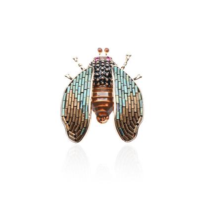 China Brass Designer Tube Beetle Brooch High Grade Handcrafted Hollow Oil Insect Brooch for sale