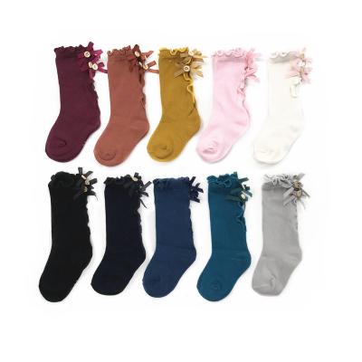 China RKS0040 Breathable Solid Bow Buttons Child Socks Knit Cotton Infant Toddler Baby Socks For Kids for sale