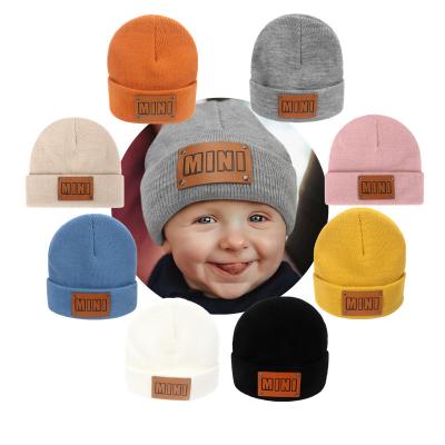 China Amazon COMMON Hot Sale Kids Autumn Label Knit Girls Caps Crocheted Warm Wool Knitted Mini Baby Winter Hats Sweater Hat for sale