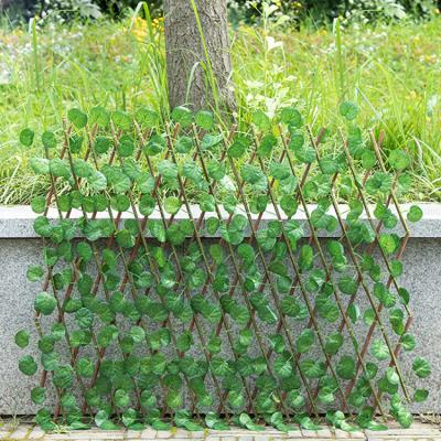 China Minimalist 0.7m Can Stretch Wholesale Green Ivy Trellis Artificial Garden Plant Fence for sale