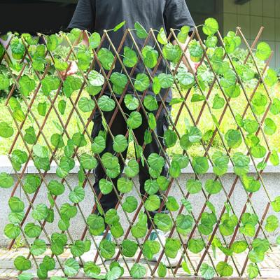 China Minimalist 0.7m Can Stretch Wholesale Green Ivy Trellis Artificial Garden Plant Fence for sale