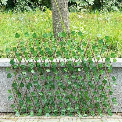 China Minimalist 0.7m Can Stretch Wholesale Green Ivy Trellis Artificial Garden Plant Fence for sale