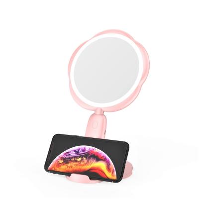 China 1X 5X Lighted Handheld Vanity Led Makeup Mirror Desktop Flower Shaped Led Hand Mirror With Cell Phone Holder for sale