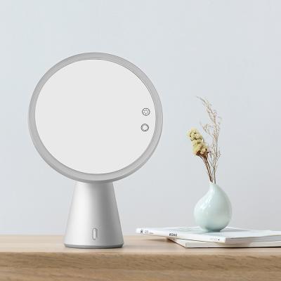 China Lighted Standing Table Touch Screen 360 Degree Rotation Led Light Smart Makeup Mirror With Speaker for sale