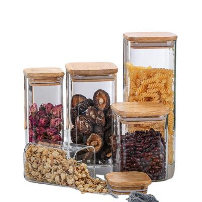 China High Sustainable Borosilicate Glass Storage Jar Square With Bamboo Lid Wooden Child Storage Jars for sale