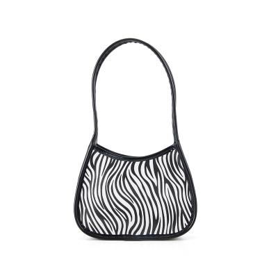 China Large Capacity In Fashion Zebra Design Pattern PU Leather Girls Women Running Armpit Handbags Shoulder Messenger Bags Women Armpit Bag for sale