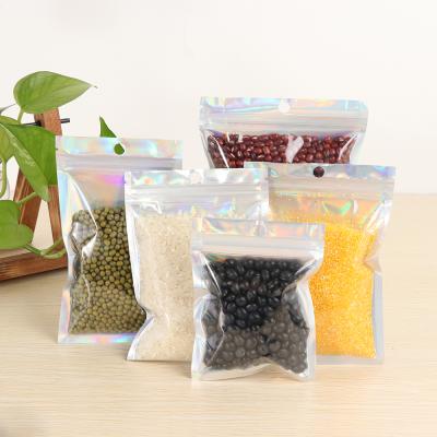 China Custom Moisture Proof Holographic Resealable Bag Aluminum Foil Zip Lock Mylar Smell Proof Packaging Plastic Bags for sale