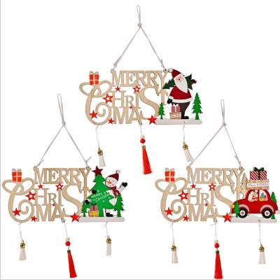 China Wooden Christmas Tree Decoration Wooden Hanging Hollow With Tassel Merry Christmas Tree Decoration Dangling Decorations for sale