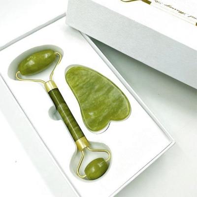 China Mini Jade Roller Anti Aging Facial Skin Rejuvenation Quartz Face Massage Gua Sha Roller Natural Stone Jade Roller for sale