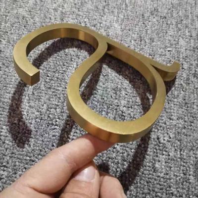 China Buildings Brushed Gold Flat Cut Fabricated Metal Letter Signs With 1cm Thick for sale