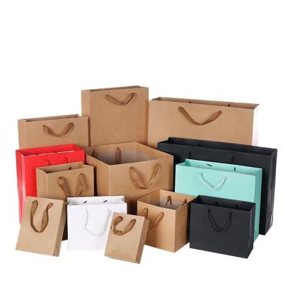 China Recyclable Custom Plaid Corrugated Kraft Paper Bag Recycled High Quality Shopping Paper Bag With Handles for sale