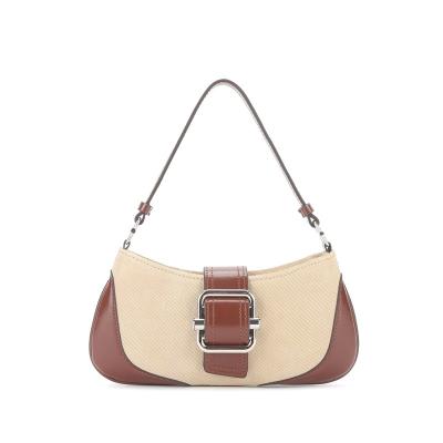 China Lady Europe and the United States retro splicing shoulder bag 2023 spring and summer new real cowhide design bag trend armpit bags for sale