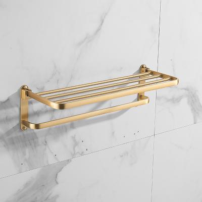 China Easy Assembly Bathroom Round Wall Mounted Towel Rack Tube Guest Towel Rack Gold Aluminum Towel Rack for sale