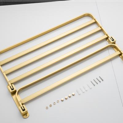 China Modern Rectangular Gold Moisture Proof Flat Tube Rolled Bath Wall Movable Rolled Towel Rack for sale