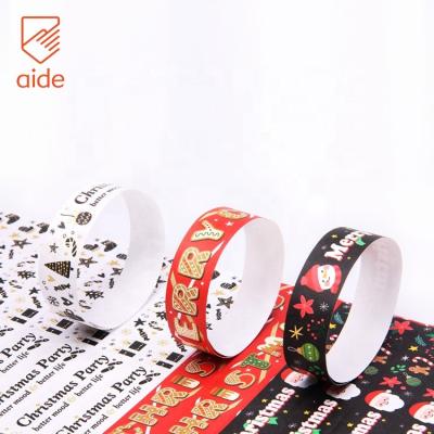 China Waterproof In Stock Popular Decoration Merry Christmas Printable Tyvek Wristbands for sale