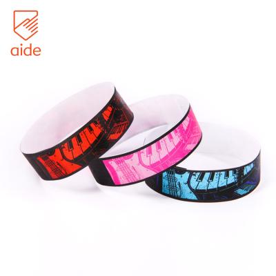 China Waterproof Buying Customized Party Event Entrance Paper Admission Wristbands With Logo for sale