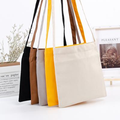 China 2021 Rope Handle Solid Color Shoulder Toss Long Handle Shopping Bag Cotton Mini Custom Small Tote Bag Folding Canvas for sale