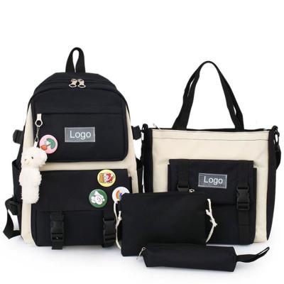 China Waterproof kids school bags black frozen four-pie cecasual sports backpacks bags school bags for girls set for sale