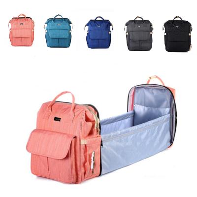 China Folding Baby Backpack Diaper Bag With Bed Changing Station 3 In 1 Baby Diaper Bag Backpack for sale